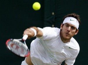 Argentina's Juan Martin Del Potro in action during the match against Belgium's Olivier Rochus at the All England Lawn Tennis Championships at Wimbledon, Thursday, June 23, 2011.(AP Photo/Alastair Grant)